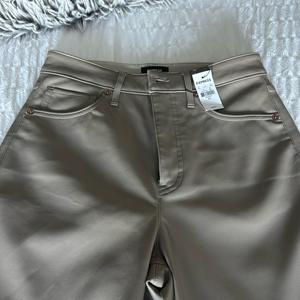Leather faux bootcut pants. Size 6R brand new with tags. Very stylish